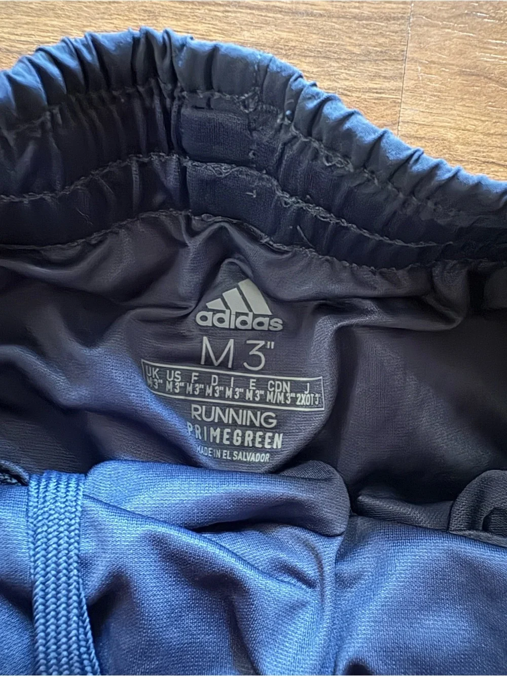 adidas Women's Dark Blue Athletic Shorts with Light Blue Trim